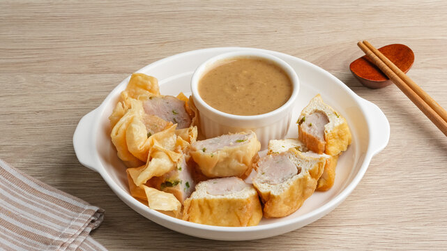 Batagor, made from fish or chicken dumpling, tofu, tapioca flour served with peanut sauce. Indonesian food