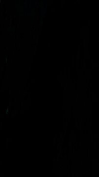 Stuttering Vertical Film Flicker Glitch Overlay, Vertical neon glitch lines flicker across dark screen. great for damaged screen