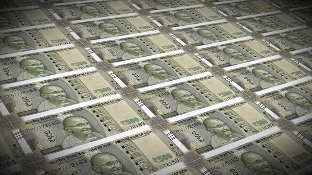 A perspective-focused shot of neatly stacked rows of Indian 500 Rupee notes. The camera subtly moves closer, drawing attention to the security features and the portrait of Mahatma Gandhi.