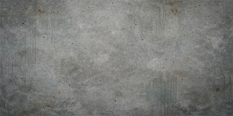 Fototapeta premium A dark and aged grunge concrete wall texture features a rough gray cement surface with a dirty vintage pattern, creating a blank stone backdrop for a textured industrial design
