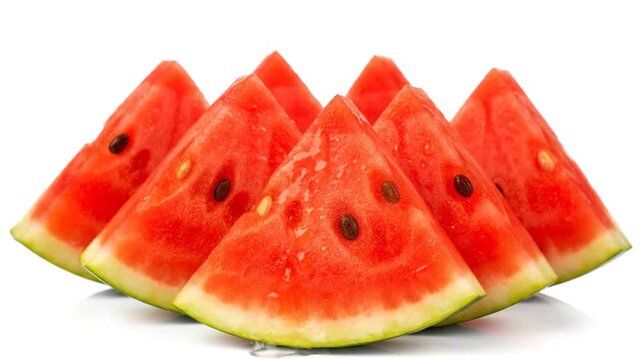 Sliced watermelon fruit on white background.