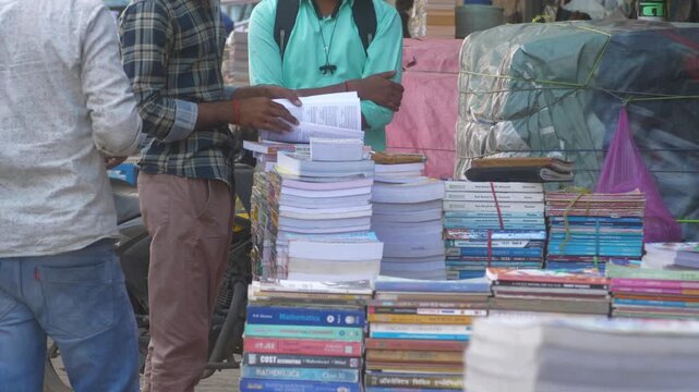 Streetside book vendors selling used books, Patna, Bihar