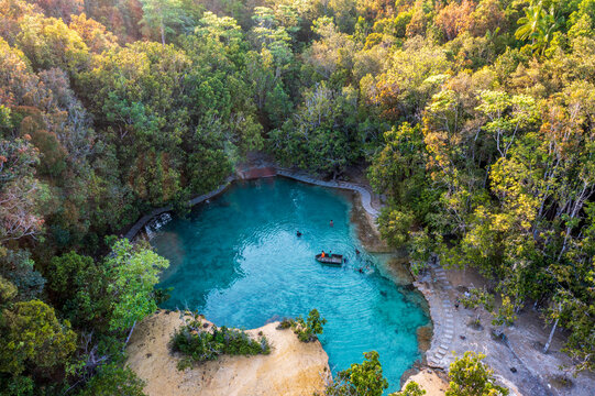 Emerald Pool is a natural spring with a greenish-blue color, located in a protected forest and wetland area within the Khao Pra-Bang Kram Wildlife Sanctuary in Krabi Province, Thailand.