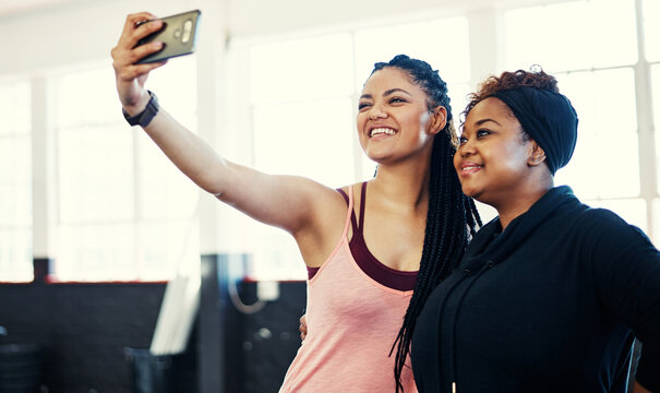 Women, friends and happy for selfie at gym with memory, bonding and break at wellness center. People, smile and photography for profile picture, exercise and post on social media at fitness club