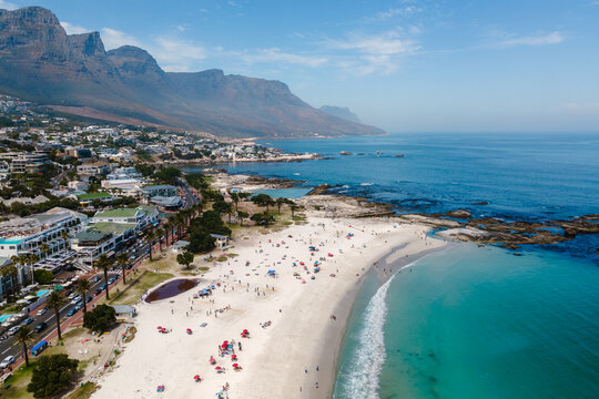 Breathtaking Camps Bay beach with golden sands and azure waters in Cape Town, South Africa