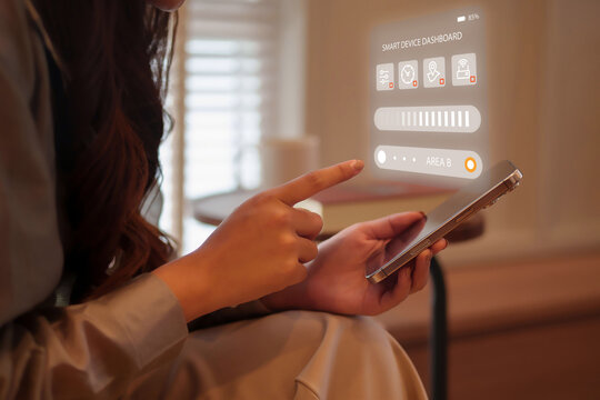 Woman using smartphone with futuristic augmented reality dashboard managing smart home devices for remote control and automation smart home augmented reality iot