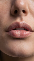 Female lips with healthy skin and smooth texture close up