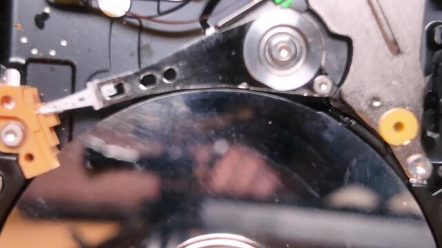 Close-up Internal Mechanism of internal components of a disassembled Computer Hard Disk Drive