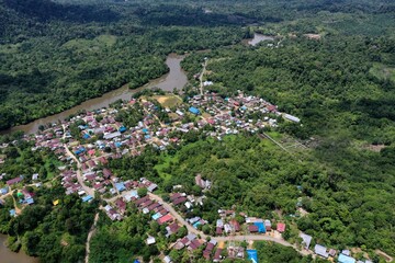Wide panoramic aerial view of Kelincauan village in Sekatak Bengara, North Kalimantan. This...