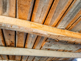 Old Wooden Ceiling with Rustic Beams, Weathered Roof Interior Texture