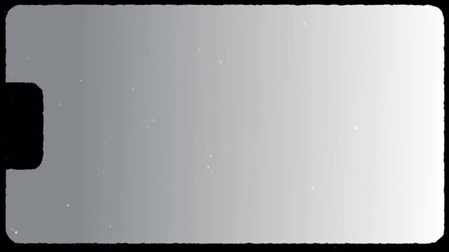 Overexposed white fade effect showing a frame Super 8 film with Film Light Leak Grain and Real 8mm Film Light Leaks, captured from a real film scan of a Real 8 mm format and Real 8 mm film. 4K Video