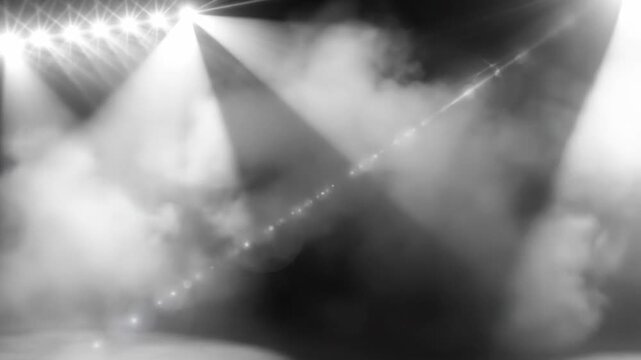 Bright stage lights illuminate the empty stage, creating a dramatic and captivating atmosphere for performance.