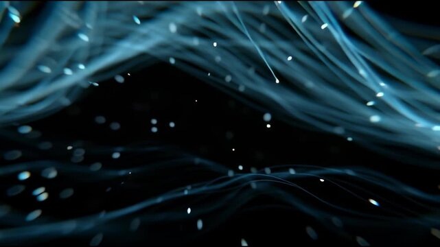 Glowing blue optical fibres against a dark background with bokeh effect