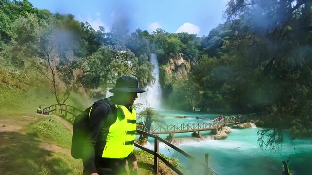 Exploring Cascada de Minas Viejas in Huasteca Potosina, San Luis Potosi, Mexico with turquoise water and lush plants