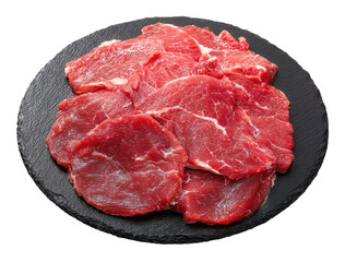 Premium raw meat and beef slices: fresh red meat, uncooked steak presented on a rustic slate plate, ready for gourmet cooking.