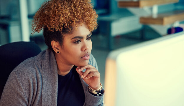 Serious, proofreading and woman with computer, office and grammar check on web, reporter or creative. Newsroom, editing and African person with tech for article, online and journalist with deadline