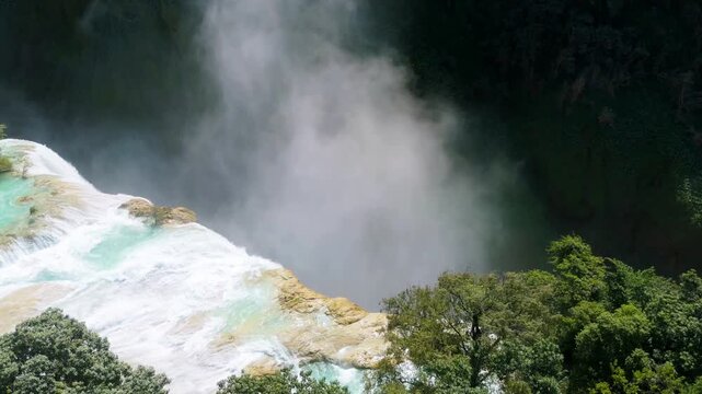 Explore Cascada de Tamul in Huasteca Potosina and its natural beauty surrounded by tropical vegetation
