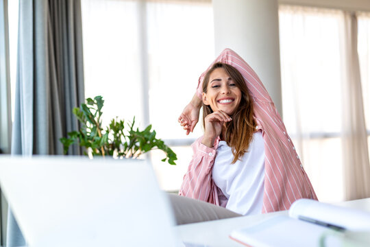 Success and Happiness at Work, Young Woman Stretching, People with healthy-lifestyle habit, Healthcare And Medicine concept. Attractive woman sitting at desk and smiling after finishing task