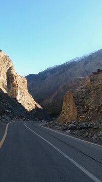 Riding on Highway carved through mountains, Naltar highway, Northern Pakistan