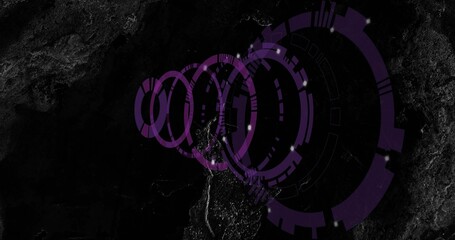 Fototapeta premium Displaying faint purple concentric rings overlaying satellite map, with lit terrain and seams