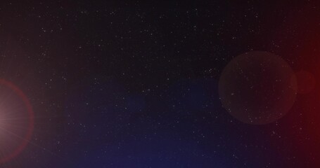 Fototapeta premium Showing dense starfield at night with left red-ring flare, right faint red flare, blue lower tint