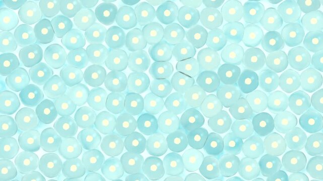 Abstract motion of glowing spherical cells underwater, microscopic view of organism or bacteria under bright light, biological research or medical background