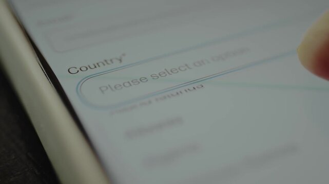 Prompt on a screen asking the user to choose their country from a selection menu