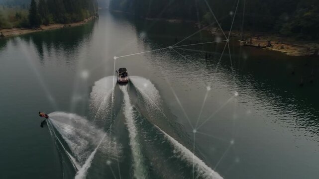 Drone following boat driver pulling rider carving twin wake for sports network overlaying sky water