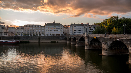 Fototapeta premium Sunset scenery in beautiful city of Angers in France, with famous chateau and cathedral