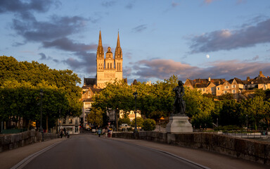 Obraz premium Sunset scenery in beautiful city of Angers in France, with famous chateau and cathedral