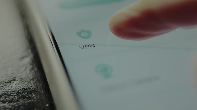 Finger points to the VPN icon, Virtual Private Network