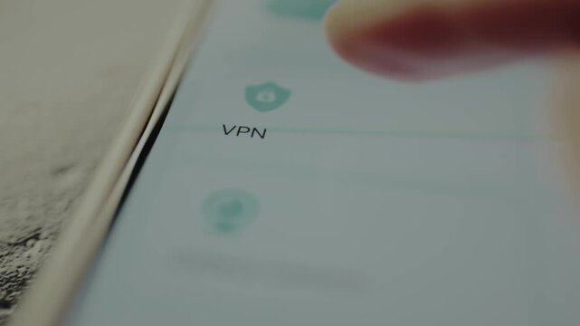 User taps the VPN icon on a smartphone screen