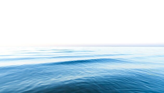 Calm blue ocean with gentle waves, horizon fades into white sky. Minimalist and peaceful scene