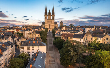 Obraz premium Aerial view with sunset scenery in beautiful city of Angers , with famous chateau and cathedral