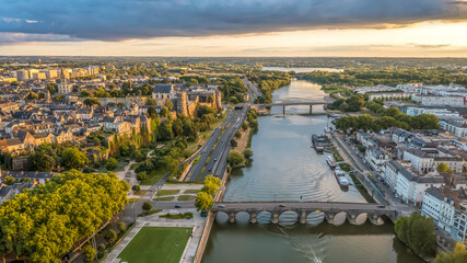 Aerial view with sunset scenery in beautiful city of Angers , with famous chateau and cathedral © Cristian Mihart