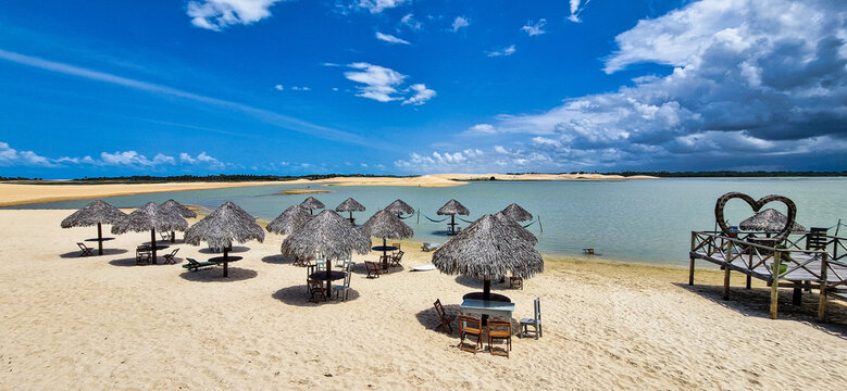 Straw huts on the banks of the Torta Lagoon, Tatajuba Beach at Jijoca de Jericoacoara, Ceara in Brazil