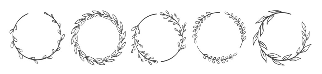 Obraz premium Laurels branches. Vector illustration of hand drawn wreaths. Doodle floral wreath frames