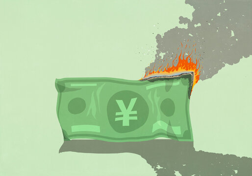 Large Chinese Yen paper bill burning on green background