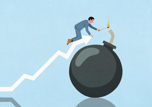 Male investor on ascending chart arrow lighting fuse of large bomb
