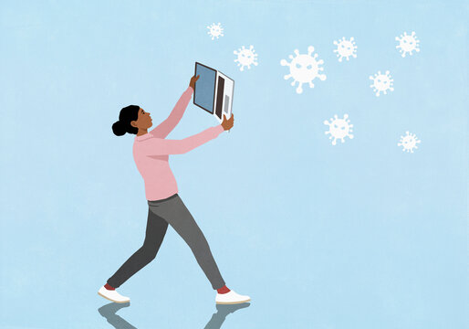 Woman with laptop block floating viruses on blue background