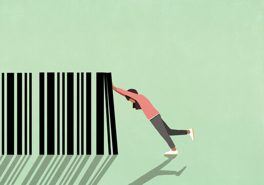 Woman pushing large bar code against green background