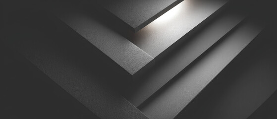 Abstract dark gray geometric shapes with a subtle, warm highlight. Minimalism is showcased