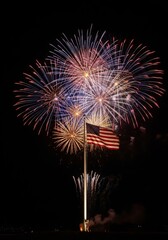 American Flag Waving Proudly under Colorful Fireworks Display at