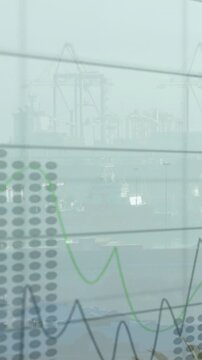 Vertical video: On grid fade-in data overlay drawing lines and labels over hazy port showing trends