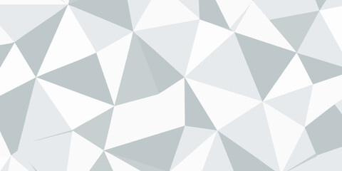Fototapeta premium Geometric Pattern of Triangles in Various Shades of Grey and White Forming a Modern Abstract Design