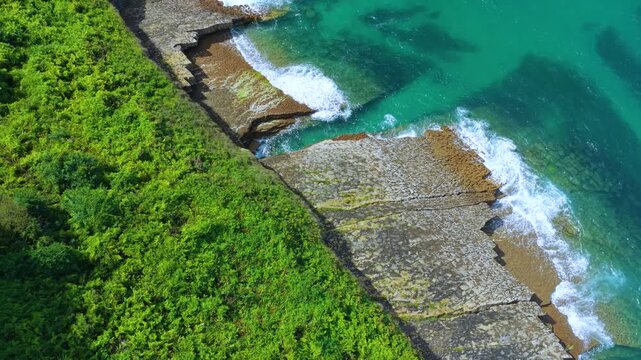 Aerial view from a drone of the coastline near Punta Ballota in the municipality of Suances. Cantabrian Sea. Cantabria. Spain. Europe