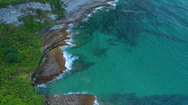Aerial view from a drone of the coastline near Punta Ballota in the municipality of Suances. Cantabrian Sea. Cantabria. Spain. Europe