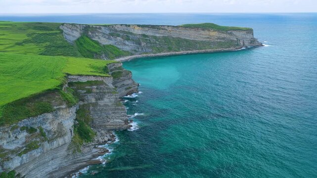 Aerial view from a drone of the coastline near Punta Ballota in the municipality of Suances. Cantabrian Sea. Cantabria. Spain. Europe