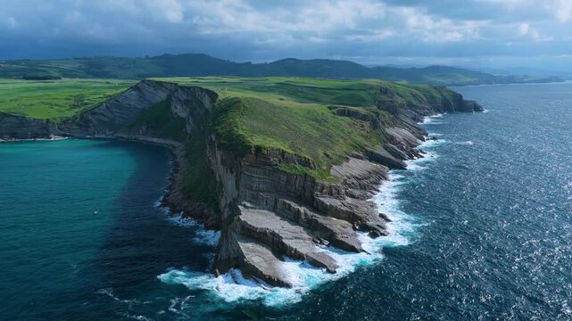 Aerial view from a drone of the coastline near Punta Ballota in the municipality of Suances. Cantabrian Sea. Cantabria. Spain. Europe