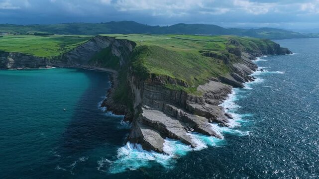 Aerial view from a drone of the coastline near Punta Ballota in the municipality of Suances. Cantabrian Sea. Cantabria. Spain. Europe